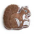 Embroidered squirrel shaped fall pillow with tufted tail and colorful woodland details
