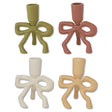 Enamel bow taper candle holder in green, blush, cream, and yellow