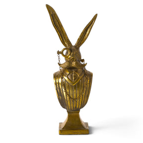 Eric the Hare gold aluminum bust with monocle mustache and tall ears