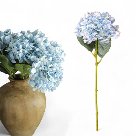 16-inch faux hydrangea stem with soft blue petals and green leaves