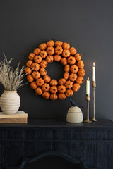 19-inch orange faux pumpkin wreath with natural dried botanicals