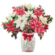 Festive poinsettia pop-up paper bouquet with red and white poinsettias, holly leaves, berries, and decorative Christmas vase
