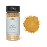 Finch + Fennel Italian Stallion Topper Seasoning jar beside seasoning blend and fries on paper