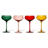 Fluted stemmed 8 oz. coupe glasses in green, blush pink, red, and amber, each with a rounded bowl and slender stem.