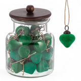 Forest green flocked heart ornament with twine hanger