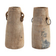 Rustic found wood milk jug with metal ring accents, approximately 10 inches tall.