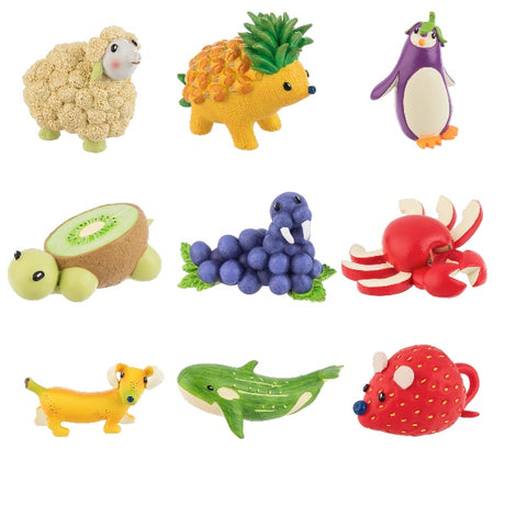 A collection of colorful resin figurines blending animals with fruits and vegetables, including a crab, mouse, penguin, turtle, whale, dachshund, walrus, hedgehog, and sheep.