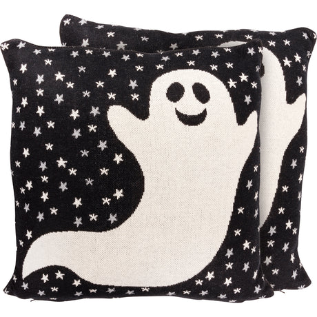 Black knit pillow with ghost figure