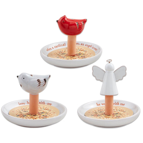 Three mini bird feeders with hand-painted toppers in angel, cardinal, and bluebird designs by Mud Pie