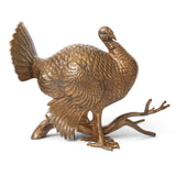 Large gold aluminum turkey sculpture on branch with detailed feathers for Thanksgiving and fall décor
