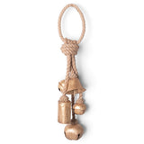  Five gold metal bells in assorted shapes hanging at staggered lengths from a knotted natural jute loop
