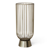 Tall gold metal wire candle holder with open vertical sides, a rounded bottom, and an embossed pedestal base
