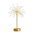 Gold starburst LED table light with 60 warm white bulbs on a gold metal base