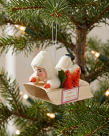 Child on Sled Christmas Ornament with Bottle Brush Trees