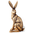 Gold resin hare figurine with detailed sculpting, 21 inches tall.