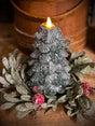 green Christmas tree shaped LED candle with moving flame and glittered finish