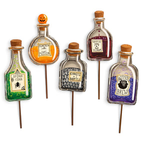 Halloween potion bottle metal decorations by The Round Top Collection in Spider Cider, Pumpkin Potion, Ghosts in a Bottle, Vampire Venom, and Witch’s Brew styles