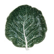Hand-painted stoneware plate in the shape of a cabbage leaf