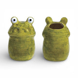 Green hand-painted ceramic frog vase with wide eyes used as a whimsical decorative planter or shelf accent