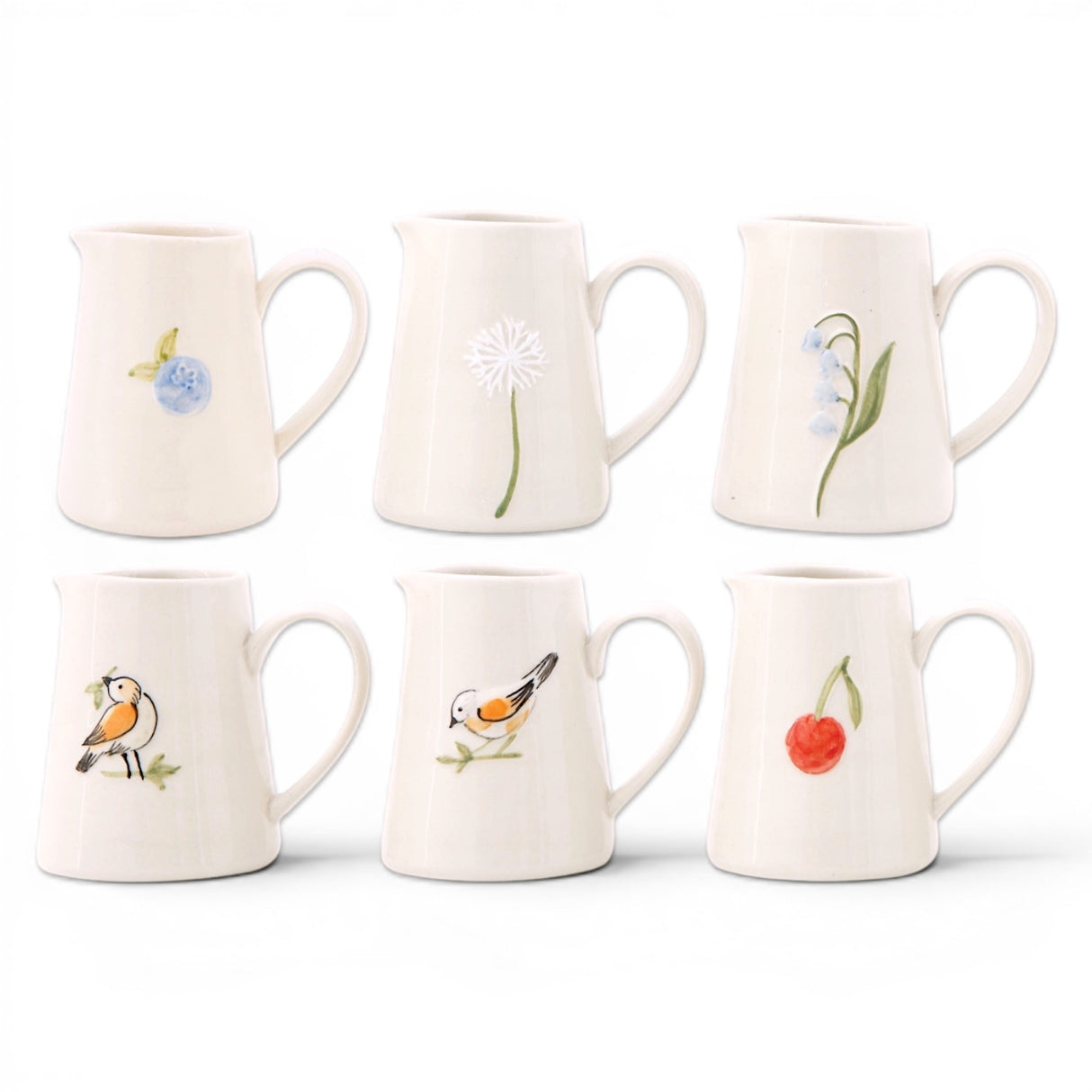 hand painted ceramic creamer pitcher with floral, bird, and fruit designs for coffee and tea service