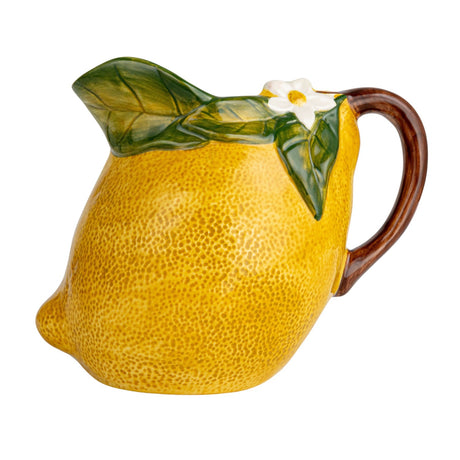 Yellow hand-painted stoneware lemon-shaped pitcher with floral accent and textured details.