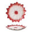 Red and white hand-painted stoneware poinsettia-shaped plate
