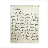 Handmade crackled wall tarp with “Darling, I Love You” quote, frayed edges, and distressed finish