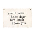 Handmade crackled wall tarp with “You’ll Never Know Dear, How Much I Love You” quote and vintage finish