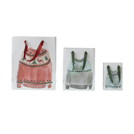 Handmade recycled paper holiday gift bags with festive sweater prints