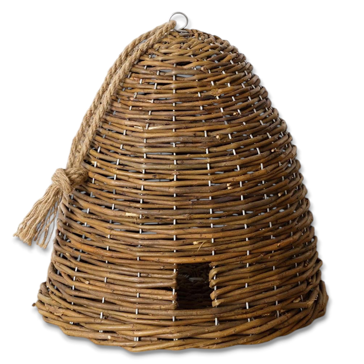 Handwoven willow bee skep with a rope accent, displayed on a white wooden stool.