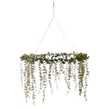 hanging faux cedar wreath measuring approximately 24 inches across.
