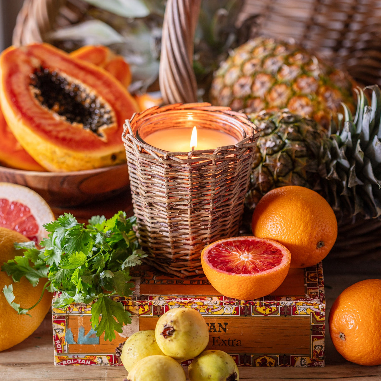 Havana candle with lemon balm and pineapple fragrance in decorative woven willow candle vessel
