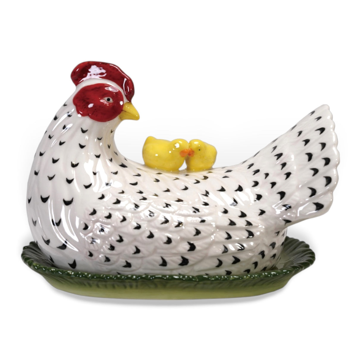 Hand-painted stoneware butter dish shaped like a speckled hen with two yellow chicks on top.