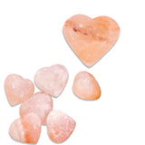 Heart shaped Himalayan salt massage stone with natural pink tones by Sugarboo
