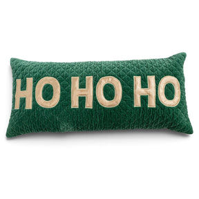 Green rectangular cotton velvet lumbar pillow with decorative quilting and large gold appliquéd HO HO HO lettering.