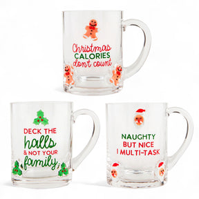 lear glass holiday mugs with funny Christmas sayings and festive accents, each sold individually