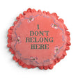 Coral pink I Don’t Belong Here round cotton velvet pillow with floral details and ruffled trim