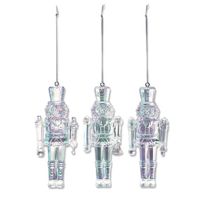 Three iridescent nutcracker ornaments
