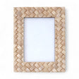 Ivory woven resin photo frame with coastal-inspired design, holding a 5" x 7" photograph.