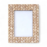 Ivory woven resin photo frame with coastal-inspired design, holding a 5" x 7" photograph.