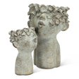 decorative cement face planters with floral hair detail for indoor plants