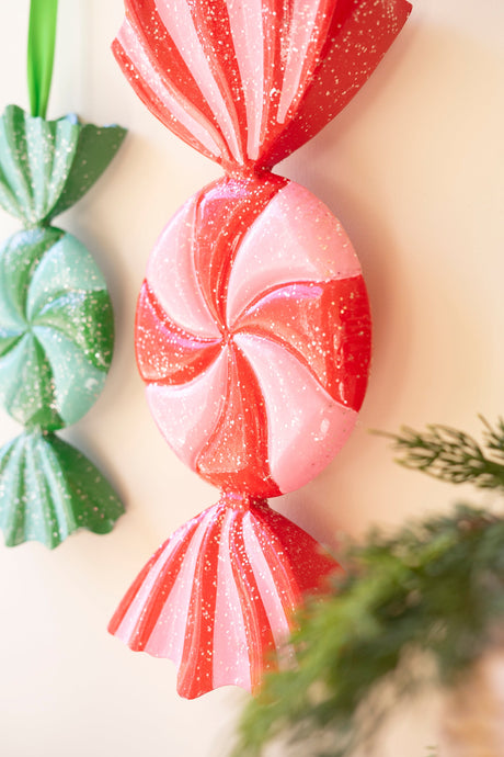 Painted metal wrapped candy ornaments with glitter details