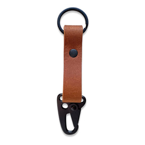 leather lever snap keychain with matte black hardware and pull-up leather detail