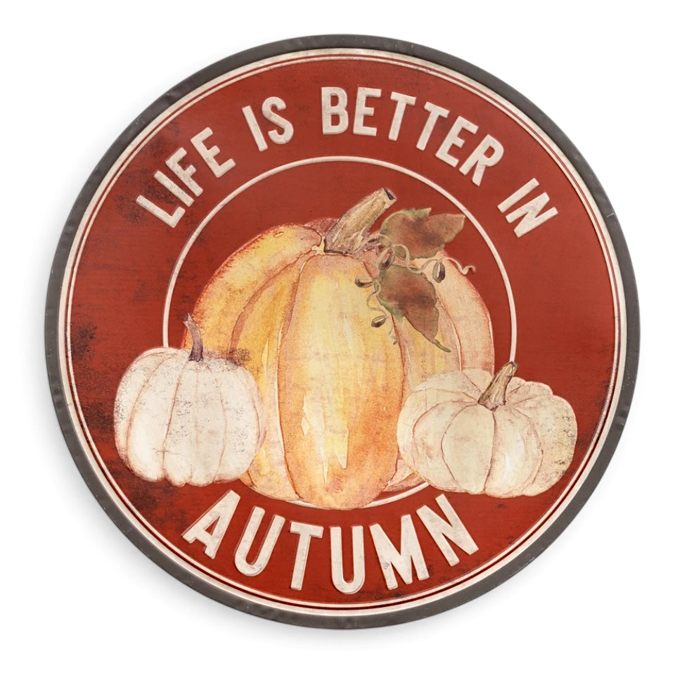 32-inch round Life Is Better in Autumn metal wall sign with orange and cream pumpkins