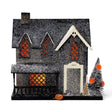 Lighted glitter Witch Cottage Halloween village house with orange windows, porch, tree, broom, and pumpkin