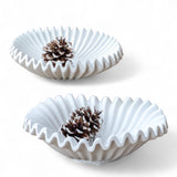 Matte white ceramic decorative bowl with ripple edge
