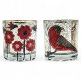 Two mercury glass tealight holders with red bird and flower designs