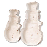 Two distressed white metal snowman trays