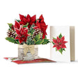 Mini Birch Poinsettia pop-up Christmas card with poinsettias, holly, pinecones, champagne bow, cardinal, and white birch log