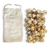 Assorted miniature gold mercury glass ornaments with embossed textures, metal hanging loops, and a natural muslin drawstring bag
